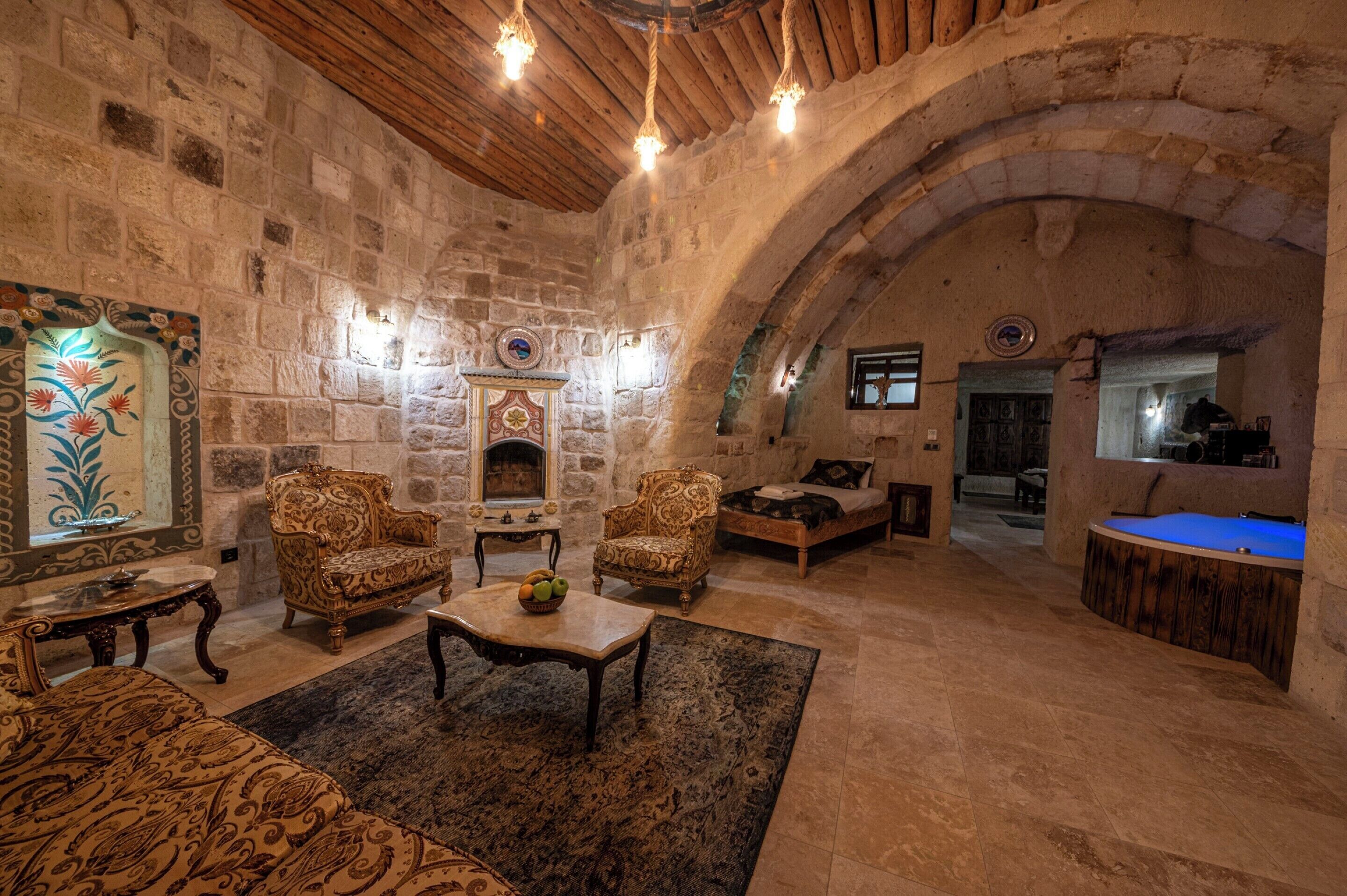 grand suite, 1 king bed, pool view | 1 bedroom, premium bedding, free minibar items, individually decorated