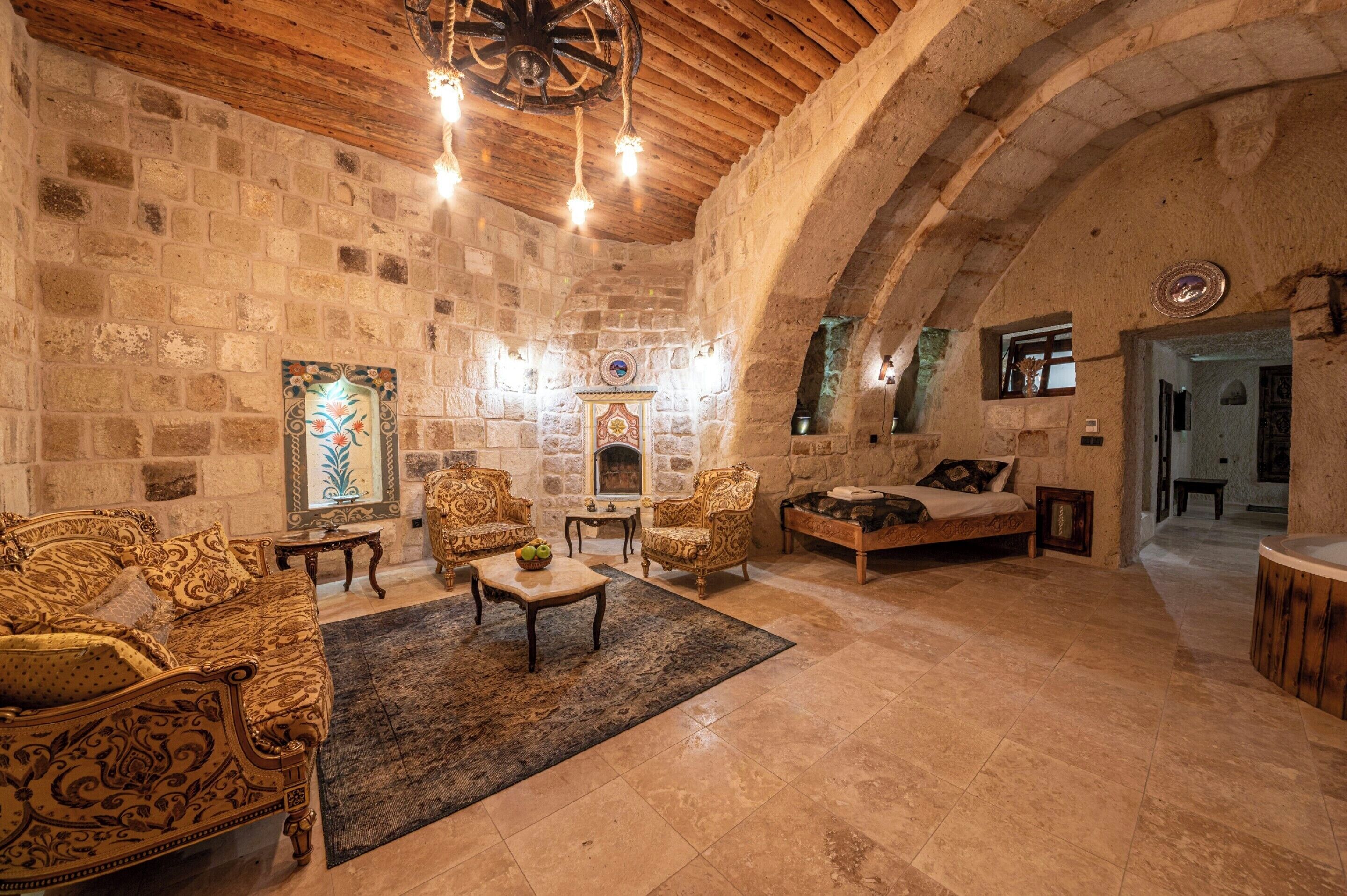 grand suite, 1 king bed, pool view | 1 bedroom, premium bedding, free minibar items, individually decorated