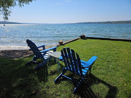 Direct Lake Leelanau sunset view, fire pit, grill, dock, boat lift, dog ok