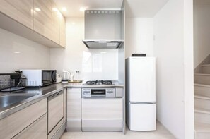 Fridge, microwave, cookware/dishes/utensils