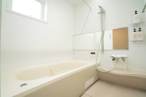 Hair dryer, towels, soap, shampoo