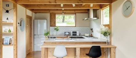 Fridge, microwave, stovetop, cookware/dishes/utensils