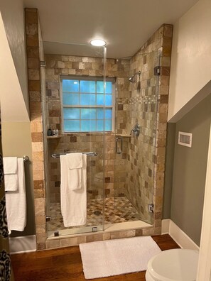 Shower, hair dryer, towels, soap