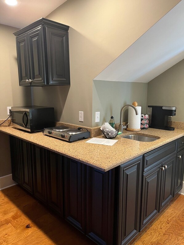 Fridge, microwave, coffee/tea maker, toaster