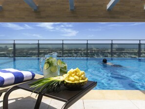 Outdoor pool, open 8:00 AM to 6:00 PM, pool loungers, lifeguards on site - Swissotel Living Jeddah (Jeddah)
