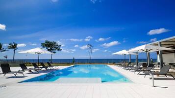 Outdoor pool, pool umbrellas, pool loungers