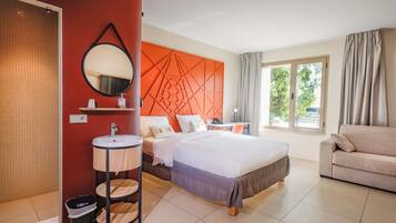 Premium bedding, down duvets, memory-foam beds, in-room safe