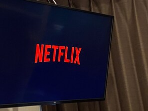 A television screen displaying the Netflix logo.