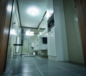 Shower, hair dryer, towels, soap