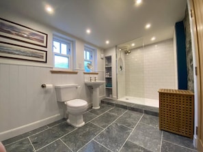 Separate tub and shower, deep soaking tub, hair dryer, towels