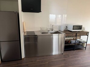 Fridge, microwave, stovetop, cookware/dishes/utensils