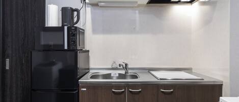 Fridge, microwave, cookware/dishes/utensils