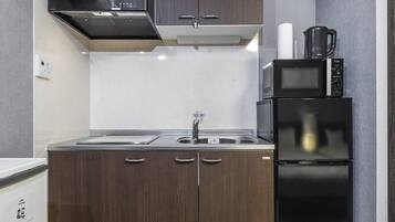 Fridge, microwave, cookware/dishes/utensils