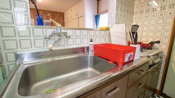 Fridge, microwave, stovetop, cookware/dishes/utensils