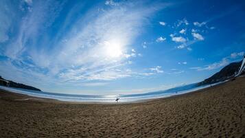 Enjoy surfing and beach activities in this coastal paradise.