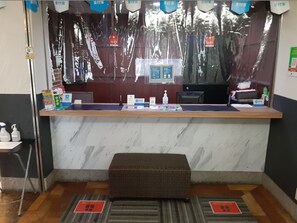 Welcome to our reception area, where friendly staff are available to assist with your stay. The reception desk offers a convenient spot to check in and plan your stay.