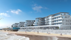 A coastal hotel with multiple balconies, a beach view, and a restaurant. - Beautiful Apartment on Ramsgate Sea-front (Ramsgate)