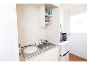 Fridge, microwave, stovetop, electric kettle