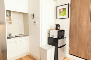 Fridge, microwave, stovetop, cookware/dishes/utensils