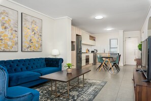 Luxury Apartment | Living area | 32-inch flat-screen TV with cable channels, TV, Netflix - Waters Edge 318 (Cape Town)