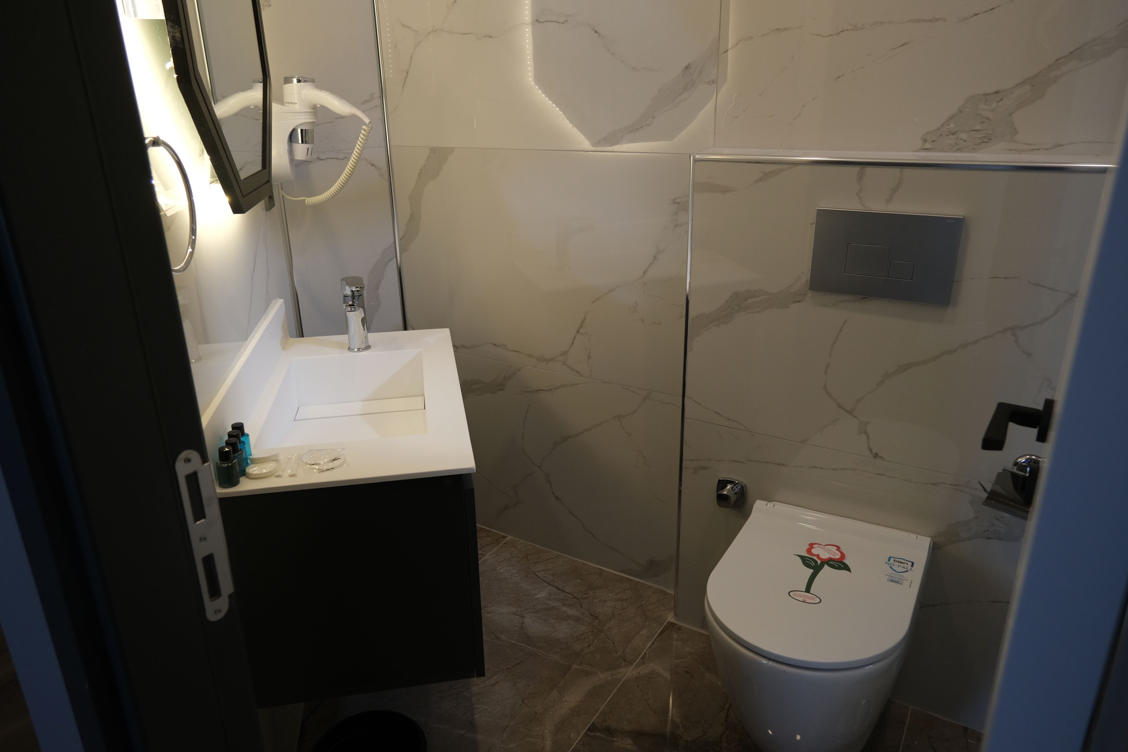 shower, rainfall showerhead, hair dryer, slippers