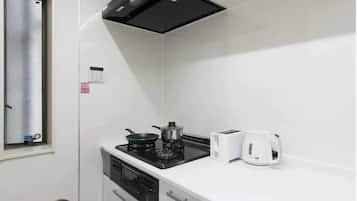 Fridge, microwave, stovetop, cookware/dishes/utensils