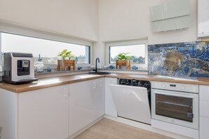 House, 4 Bedrooms, Sauna, Lakeside | Private kitchen | Microwave, dishwasher, coffee/tea maker, highchair - Holiday House Przystan Baltic by Renters (gmina Wolin)