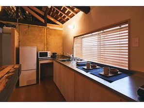 Fridge, microwave, stovetop, cookware/dishes/utensils