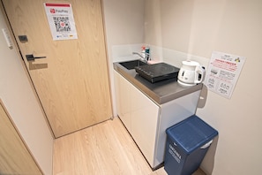 Fridge, microwave, electric kettle, cookware/dishes/utensils