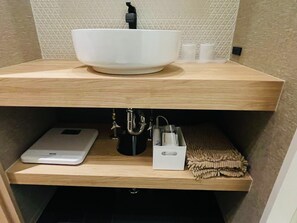 Hair dryer, towels, soap, shampoo