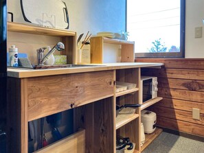 Fridge, microwave, stovetop, cookware/dishes/utensils