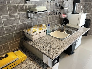 Fridge, microwave, stovetop, cookware/dishes/utensils
