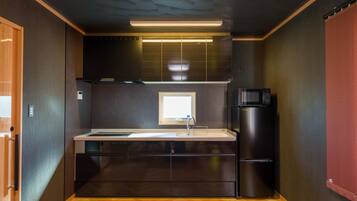 Fridge, microwave, electric kettle, cookware/dishes/utensils