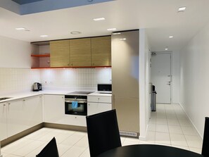 Appartamento | Cucina privata | Frigorifero, microonde, forno, piano cottura