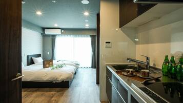 Fridge, microwave, cookware/dishes/utensils