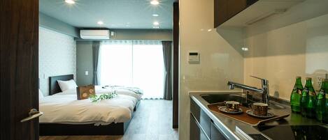 Fridge, microwave, cookware/dishes/utensils