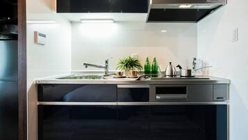 Fridge, microwave, cookware/dishes/utensils