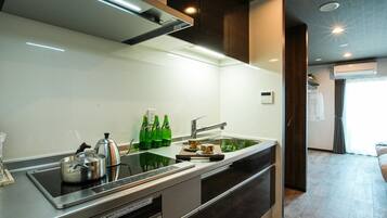 Fridge, microwave, cookware/dishes/utensils