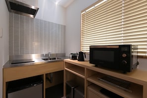 Fridge, microwave, stovetop, cookware/dishes/utensils