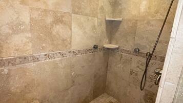 Combined shower/tub, hair dryer, towels, toilet paper