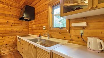 Fridge, microwave, stovetop, cookware/dishes/utensils