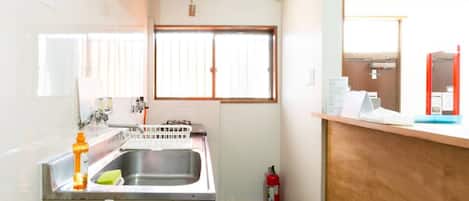 Fridge, microwave, stovetop, cookware/dishes/utensils
