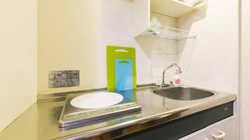 Fridge, microwave, stovetop, cookware/dishes/utensils