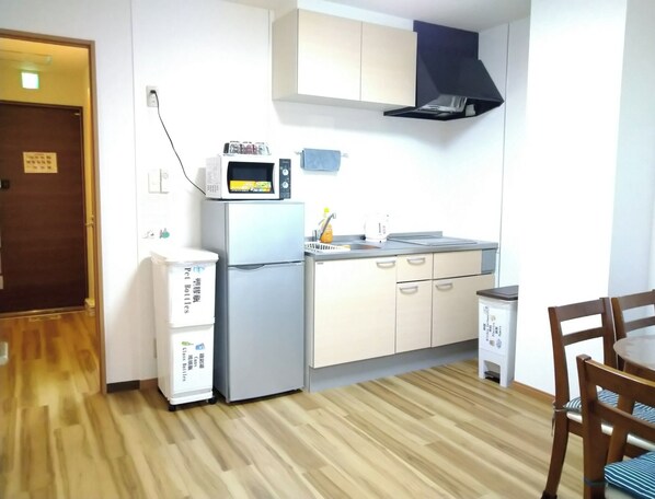Fridge, microwave, cookware/dishes/utensils