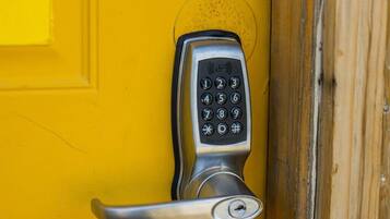 A door with a numeric keypad lock.