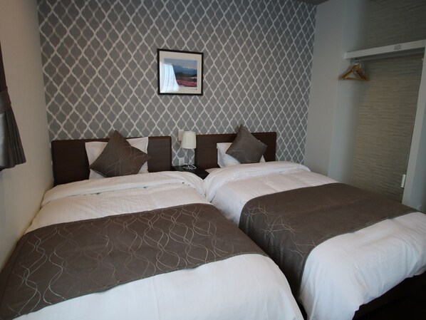 1 室のベッドルーム、デスク、WiFi (無料)、ベッドシーツ