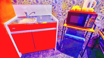 Fridge, microwave, cookware/dishes/utensils