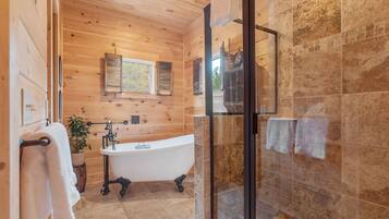 Combined shower/bathtub, hair dryer, towels, soap