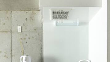 Fridge, microwave, electric kettle, cookware/dishes/utensils