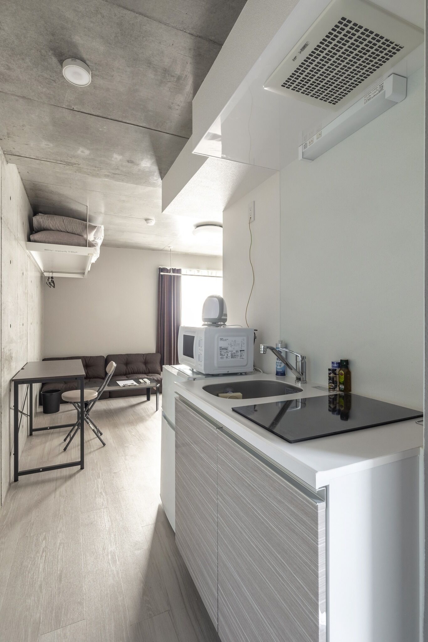 Fridge, microwave, electric kettle, cookware/dishes/utensils